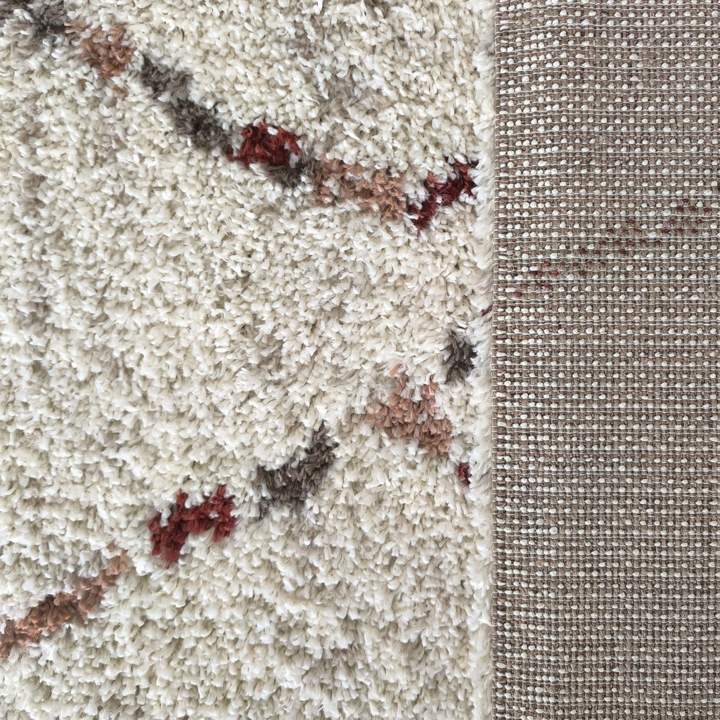 Poils longs du tapis Arles et envers tissé du tapis