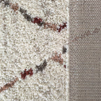 Poils longs du tapis Arles et envers tissé du tapis